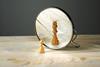 A pawn before a mirror, reflected as a king