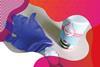 Photo of bicarbonate of soda, a teaspoon and a purple plastic glove