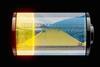 A battery with a background of yellow sulfur on a dockside