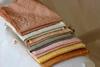 Several fabrics that have been dyed different colours