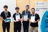 Students collecting a trophy and certificates for the RSC Top of the Bench competition