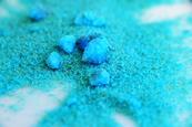 Hydrated copper sulfate crystals (blue in colour)