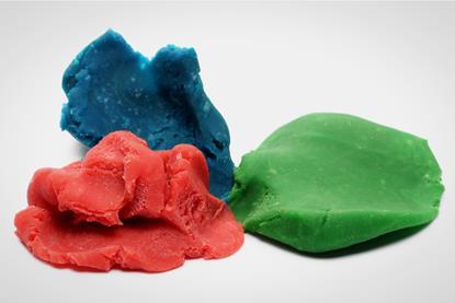 Three blue, red and green lumps of plasticine