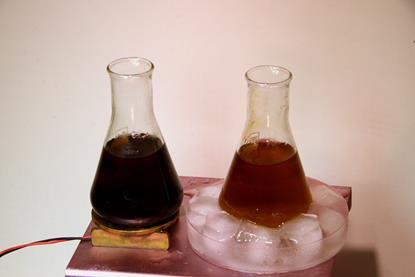 Two iodine clock reactions in beakers showing how rate of reaction is affected by temperature