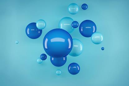 A 3D rendered illustration of dark and light blue spheres or bubbles against a turquoise background
