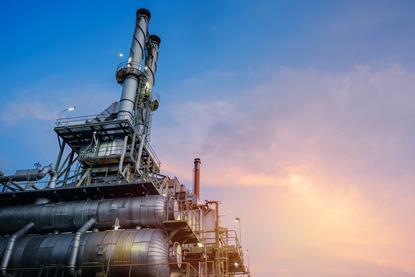 A photograph showing the outside of an industrial furnace and heat exchanger, used in the cracking of hydrocarbons